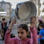 Gaza City malnourished child waiting for food amid a declared famine