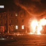 Rescue teams searching rubble after Russian missile and drone attack in Kyiv