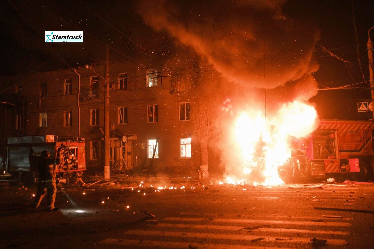 Rescue teams searching rubble after Russian missile and drone attack in Kyiv