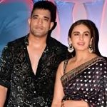 Huma Qureshi and Rachit Singh at Bollywood red carpet smiling and posing.