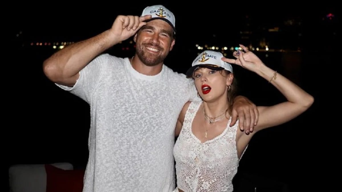 Taylor Swift and Travis Kelce smiling at event as wedding speculation swirls
