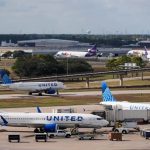 Passengers waiting at crowded US airport during nationwide flight cancellations caused by government shutdown