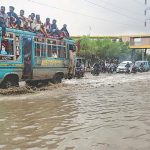 Karachi rain deaths flooding streets April 2026