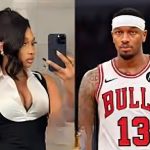 Megan Thee Stallion in a black mesh gown alongside Ja Morant in his Memphis Grizzlies jersey.