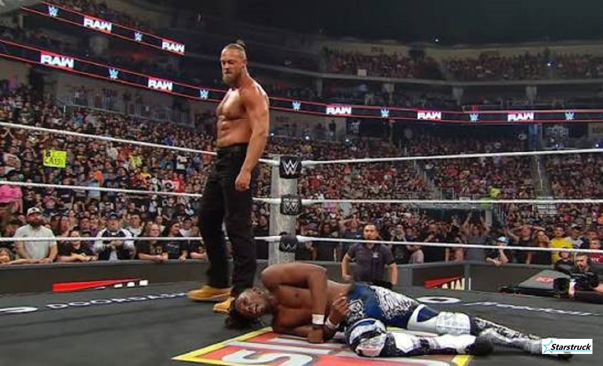 Big Cass making his surprise return to WWE Raw and standing over Je'Von Evans.