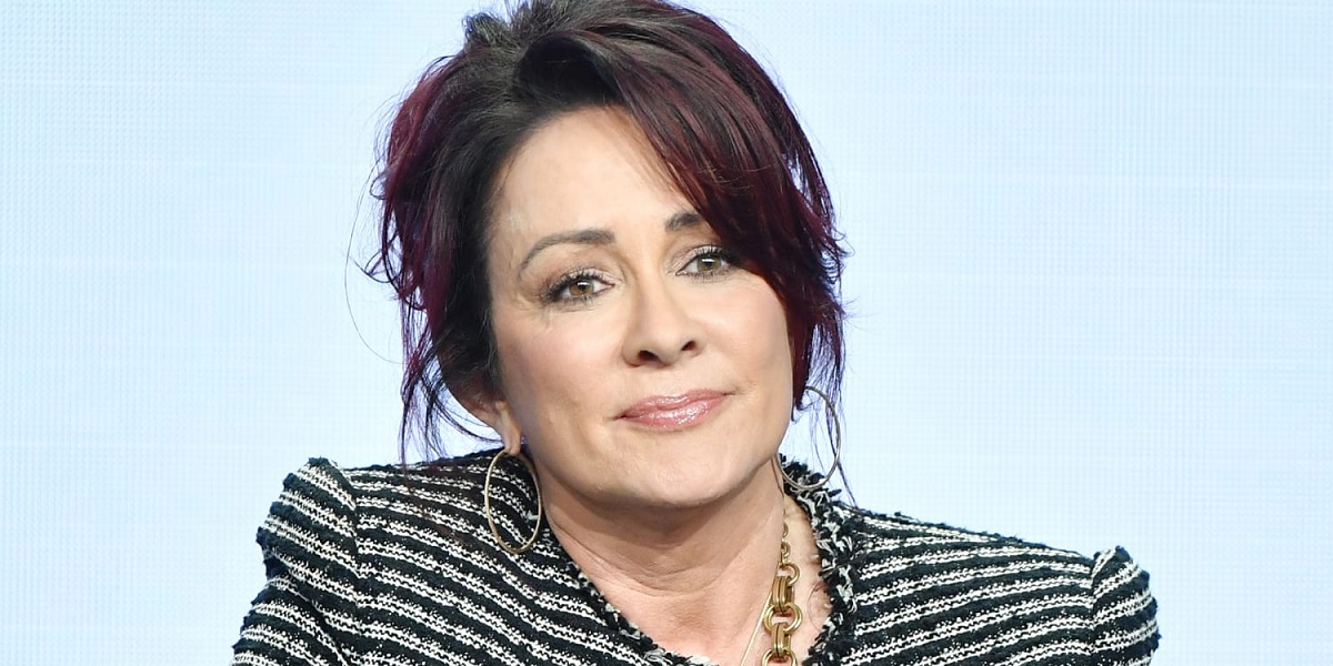 Actress Patricia Heaton smiling at an industry event after opening up about her sobriety journey and empty nest transition.