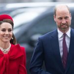 King Charles III and Kate Middleton Princess of Wales standing together at a formal royal event, highlighting the monarchy's branding conflict over her official name spelling.