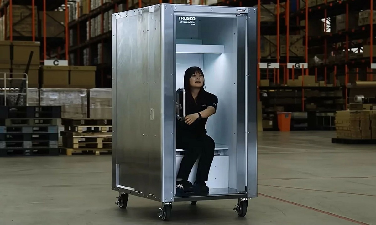 A walk-in Do Hiemon cooling box human fridge installed in a sunny public square in Tokyo Japan.
