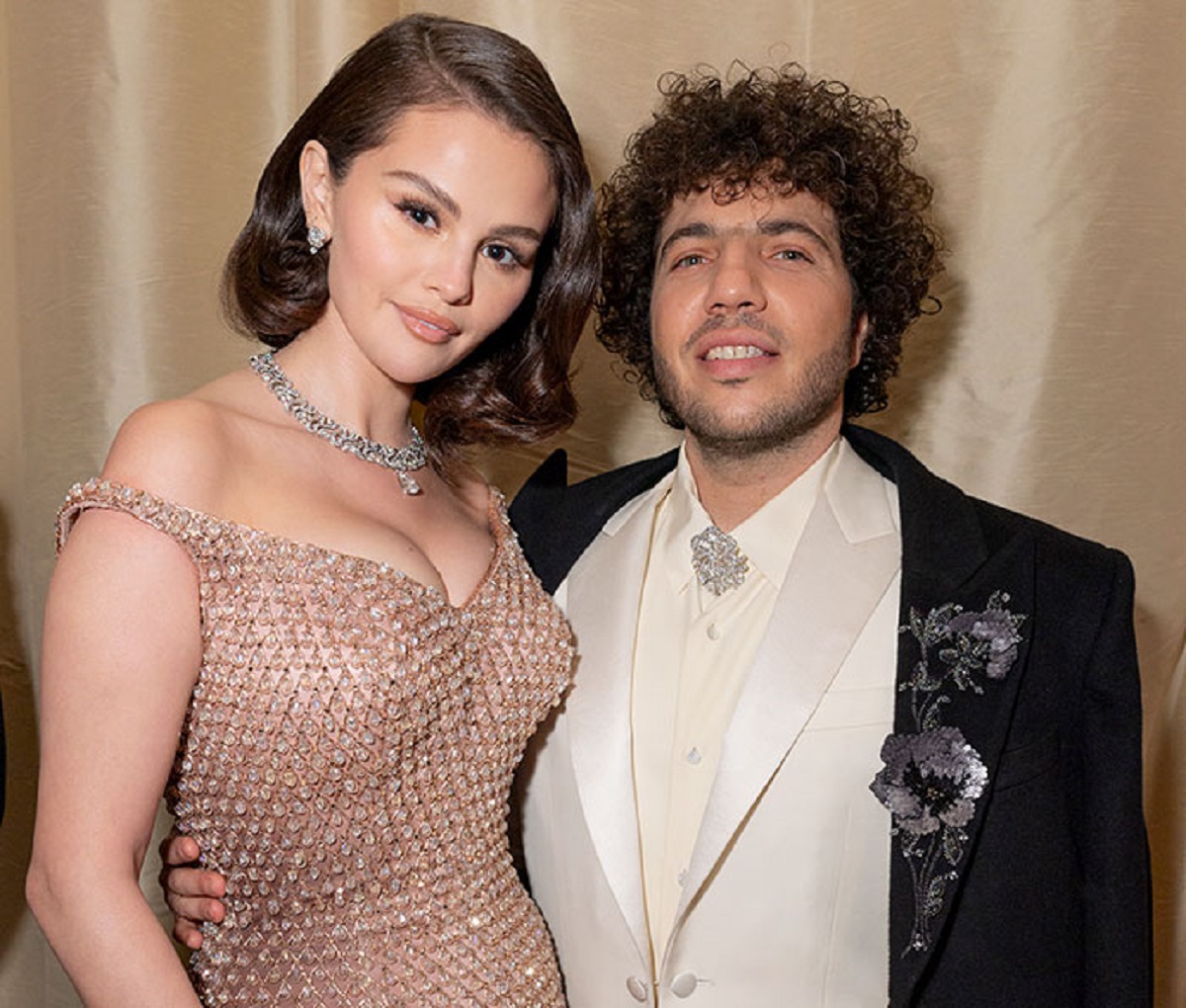 Selena Gomez and Benny Blanco smiling together at a celebrity event