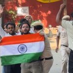 Ashutosh Ranka and CJP protesters carrying the Indian national flag at Jantar Mantar in Delhi.