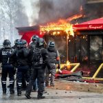 Police and protesters clash during France's cost-of-living demonstrations in October 2026.